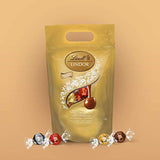 Lindt Lindor Milk Chocolate Truffles Bag - Approx 80 balls, 1 kg - Chocolate Truffles with a Smooth Melting Filling